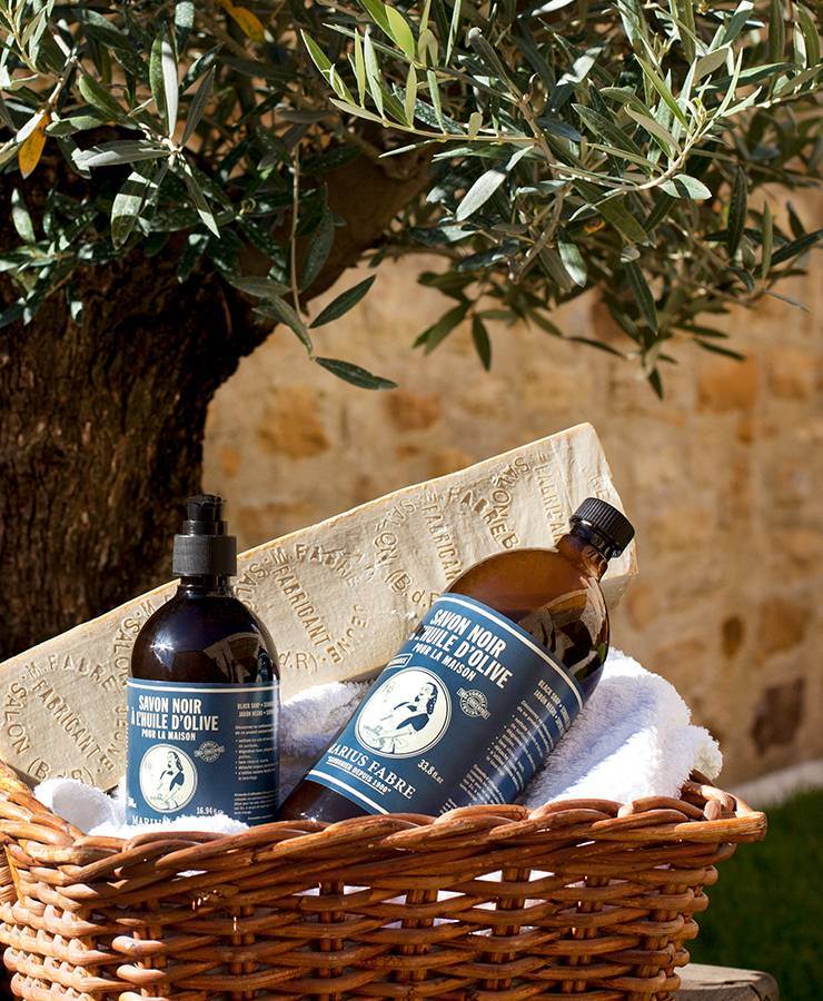 Marius Fabre olive oil black soap range in a basket – 1 L bottle pictured with the 500 mL pump