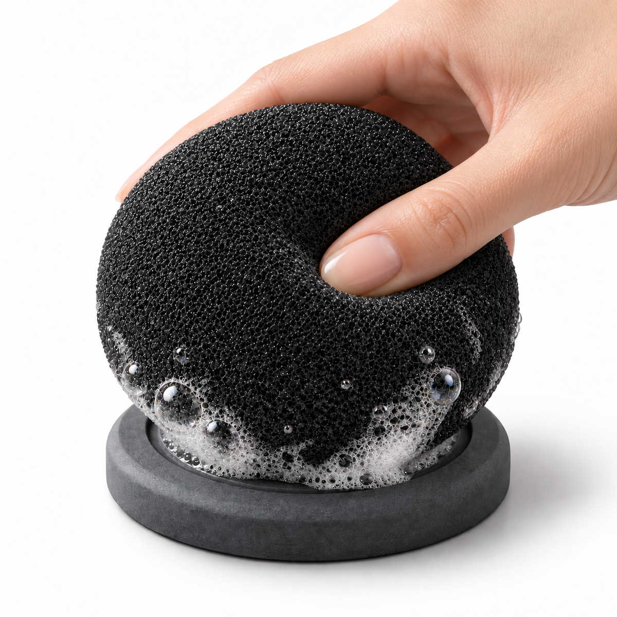 ORB Sponge + Drying Base — Squeezing a Sudsy Black Foam Orb