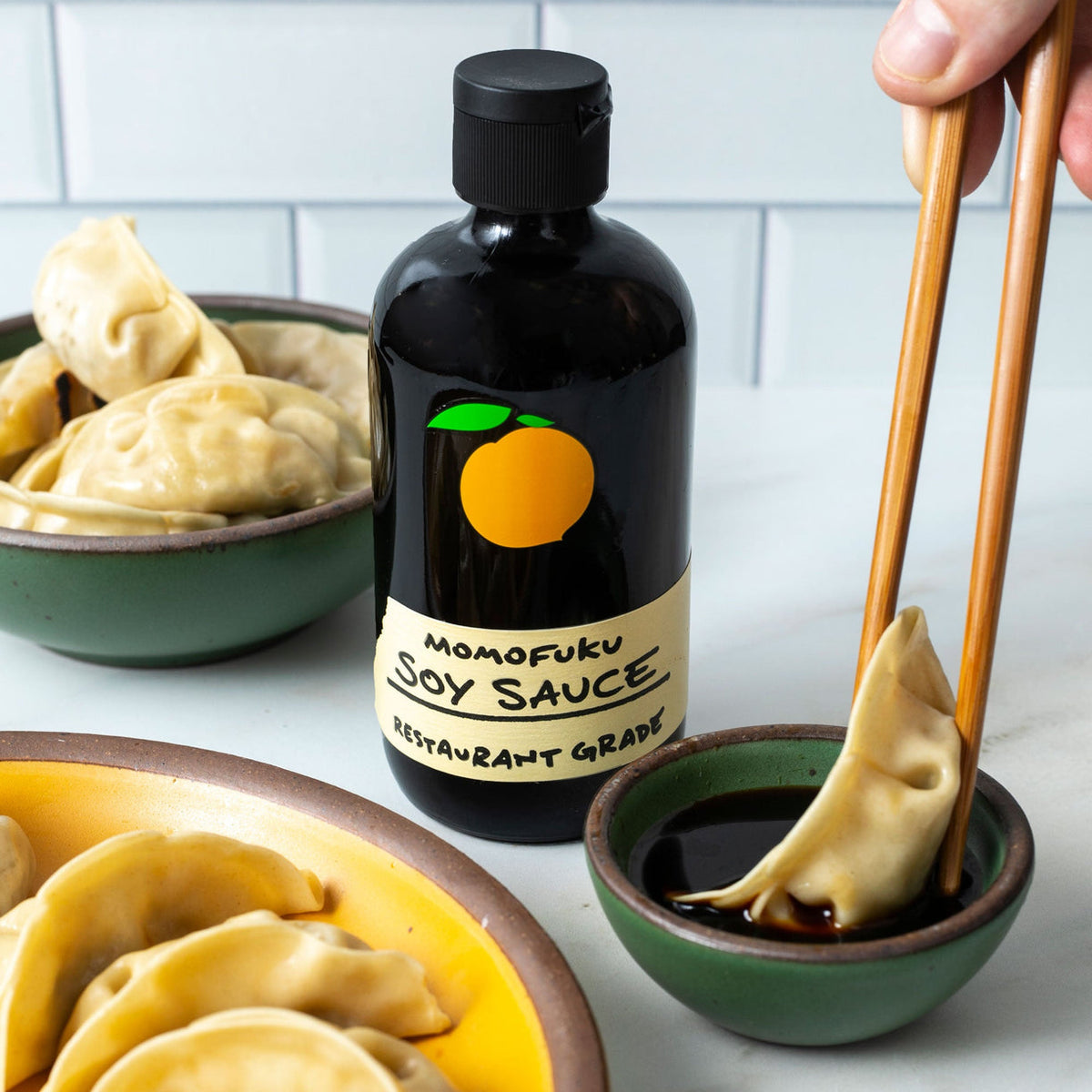 Dumpling dipped in Momofuku Soy Sauce
